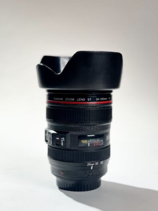 Imagen de Hucha con forma de lente de cámara