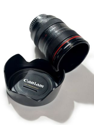 Imagen de Hucha con forma de lente de cámara